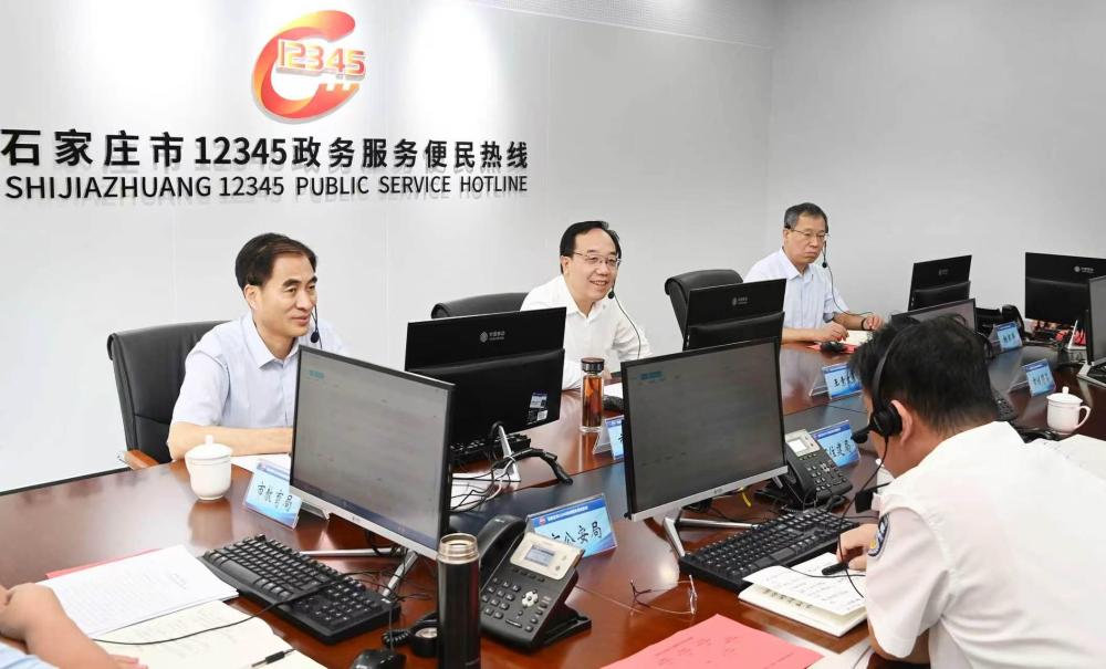 王素文接听12345博彩信誉平台便民热线
